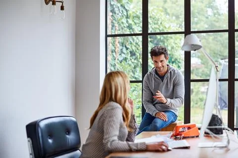 Meeting, computer and creative team in office for project management, discussion Stock Photos