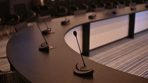 Meeting conference room empty table microphone chair corporate boardroom Video stock 334027264