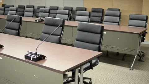 Meeting conference room empty table microphone chair corporate boardroom Stock Footage 334027354