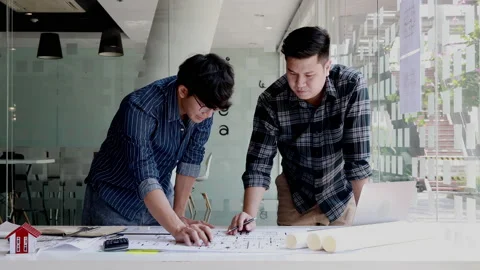 Meeting of engineers and architects in building planning, Consulting and brai Stock Footage 155069770