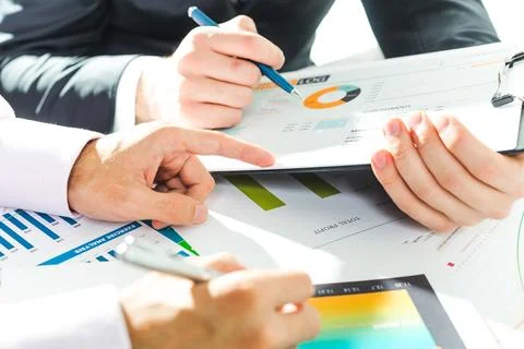 Meeting focused on data analysis and strategy development at a modern office Stock Photos