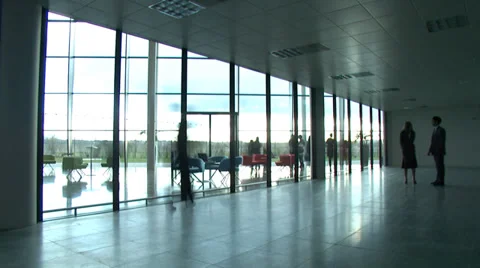 Meeting in large office environment.  Making deals within empty offices. High Vídeo Stock 32718792