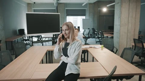 Meeting in office with professionals discussing projects and making calls Video stock 310557397