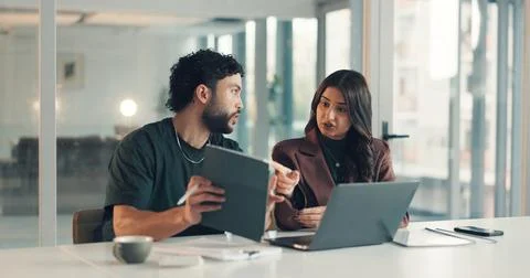 Meeting, problem solving or tech support with man and woman in office together Stock Photos