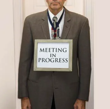 Meeting in progress sign Stock Photos