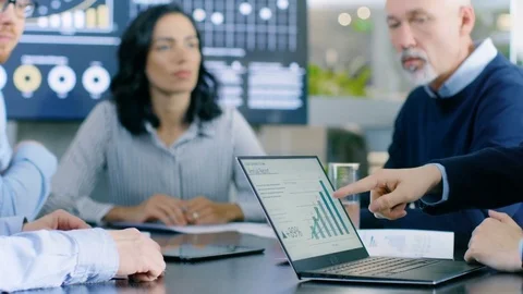 In the Meeting Room Diverse Group Business People Respond to the Money Growth Stock Footage