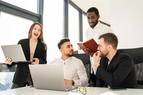 Meeting of the team of software developers in the office Stock Photos