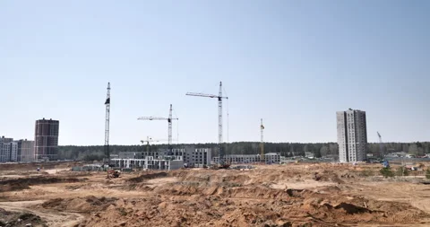 Mega Construction Site: Towering Cranes Over Urban District Project Stock Footage 242034827