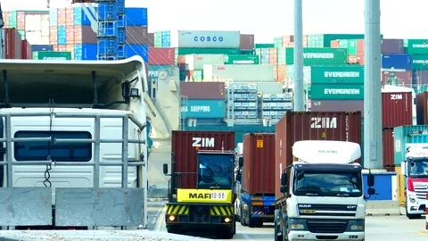 Mega container ship with busy container terminal 4k intro video for business Stock Footage 96190743