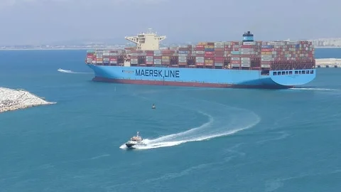 Mega container ship MAERSK sail out of port full of cargo HD Stock Footage 135965240