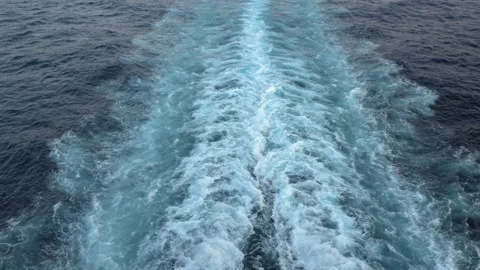 Mega ship leaving water trail in the sea Stock Footage 251742407