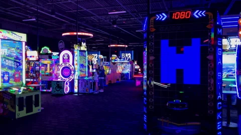 Mega Stacker and Crossy Road arcade machines in a colorful modern gaming Dave-26 Stock Footage 339533798