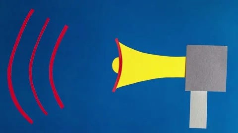 Megaphone on blue background, stop motion, animation. Video stock 159345161