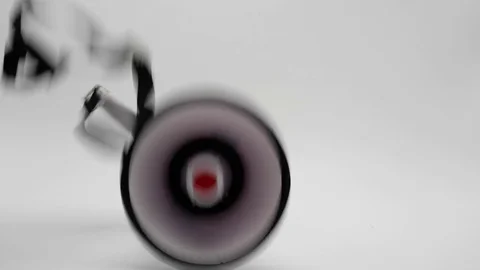 Megaphone Falling to Ground Isolated on White Stock Footage 80936881