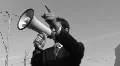 Megaphone man. Sped-up shot. HD Footage