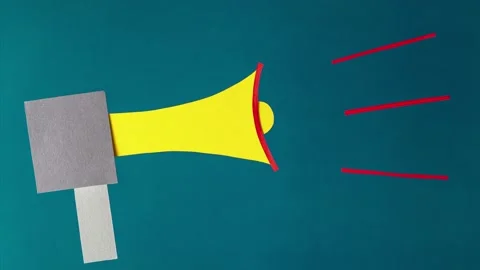 Megaphone on turquoise background, stop motion, animation. Stock Footage 159345136