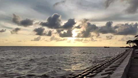 Meghna River with Dramatic Afternoon Sky – Slow Left to Right Pan 4K Footage Stock Footage 342774065