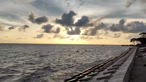 Meghna River Embankment and Dramatic Afternoon Sky – Slow Pan 4K Footage Stock Footage 342774009