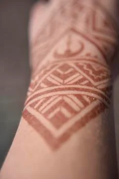Mehendi pattern on woman's hand Stock Photos