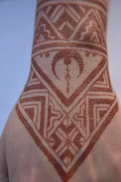 Mehendi pattern on woman's hand Stock Photos
