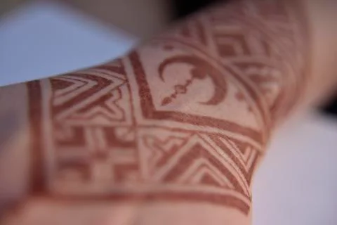 Mehendi pattern on woman's hand Stock Photos
