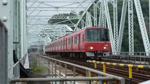 A Meitetsu train passing over the Inuyama Bridge(犬山橋) Stock Footage 297648960