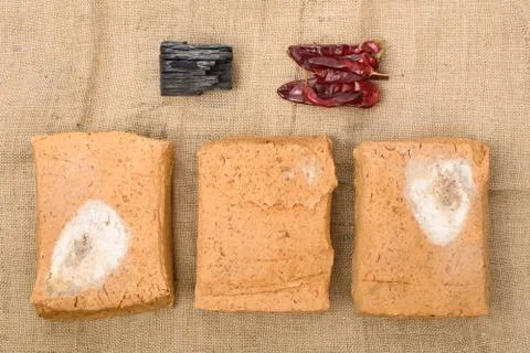 Meju and basic ingredients to make doenjang Stock Photos