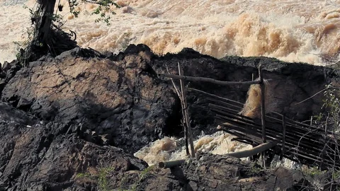 Mekong river, Laos. Fish net and fishing structure in the middle of the Mekong. Stock Footage 111256255