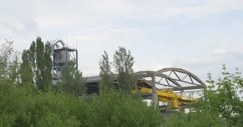 Melal Constructions of Grain Elevator Through The Trees Stock Footage 50675687
