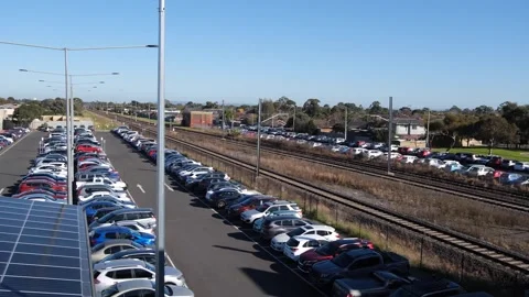 Melbourne Australia-A train glides past Hoppers Crossing station Vídeo Stock 246540626
