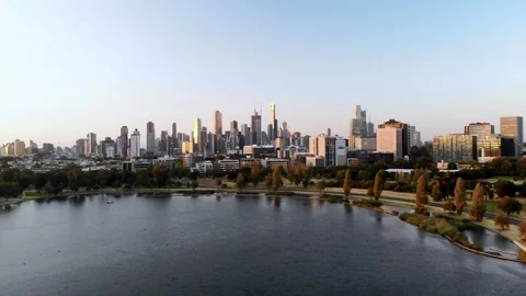 Melbourne CBD and Albert Park Lake Aerial View Shot During Sunset Stock Footage 102162358