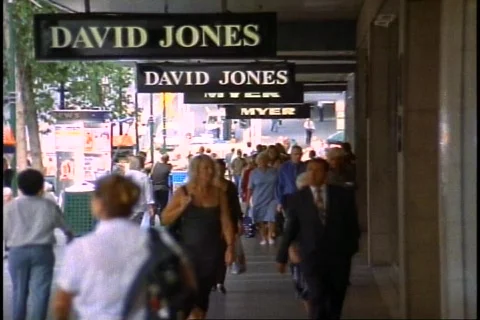 Melbourne, crowd passing under arcade, medium shot Stock Footage 867713