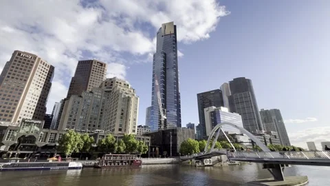 Melbourne: Evan Walker Bridge spanning the Yarra River and city skyline, 4K Stock Footage 291514092