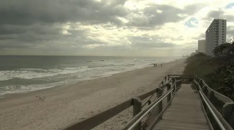 Melbourne Florida Beach breaking waves partly sunny Stock Footage 10830868
