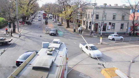 Melbourne Intersection with cars, buses, and trams Stock Footage 40709366