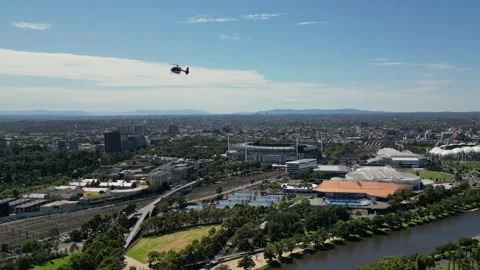 Melbourne MCG helicopter going over suburb 스톡 동영상 266749092