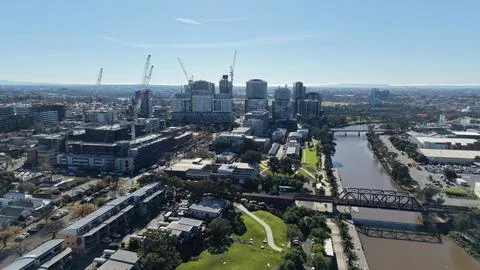 Melbourne skyline developing with city buildings and Yarra River Stock Photos