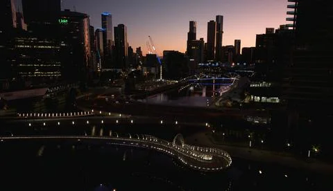 Melbourne Skyline lighted up with reflection in the river. Stock Photos