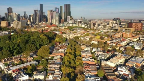 Melbourne skyline to tree-lined street Stock Footage 263433141