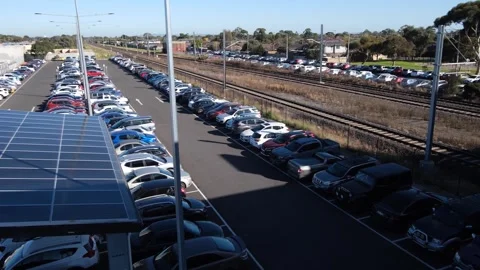 Melbourne VIC Australia-A train glides past Hoppers Crossing station Stock Footage 246540497