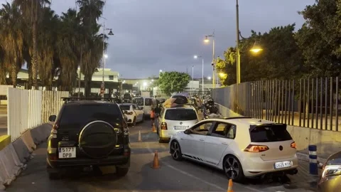 Melilla border remains closed as hundreds of vehicles queue at Strait crossing,  스톡 동영상 340966709