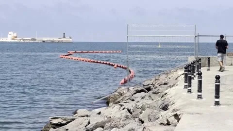 Melilla's floating barrier is a "temporary and provisional" measure to turn back Stock Footage 342151408