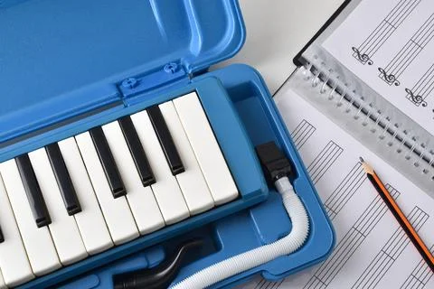 Melodica in case elements for the study of music Stock Photos