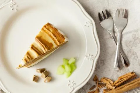 Melon and caramel cake slice with forks Stock Photos