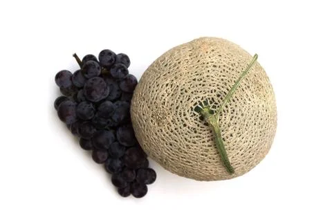 Melon and grape on white background Foto stock