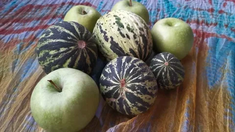 Melon and Green Apple Standing On The Table 2 Stock Footage 142515317