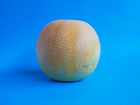 Melon with Blue Background Stock Photos