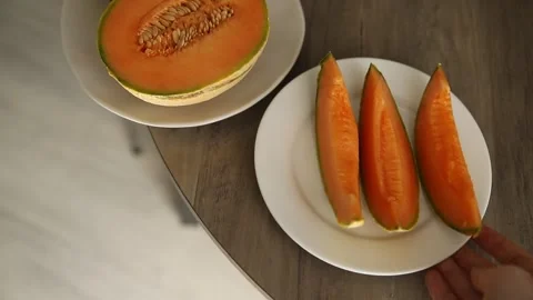 Melon Charente slice ripe sweet fruit tasty snack fresh delicious gourmet food Stock Footage 317101491
