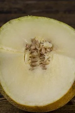 Melon grown in a cold climate with a small amount of pulp and a lot of seeds, Stock Photos