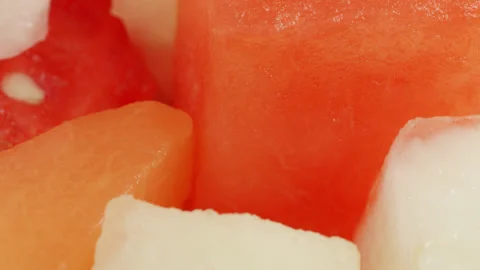 Melon mix cubes macro close up presentation slowly rotating stock footage 库存影片 344694657